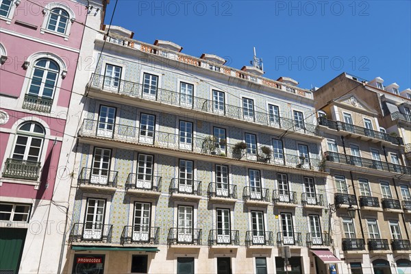 Building facades of an old town with multi-storey buildings and balconies under a clear sky, house with tiles, azulejos, Rua da Misericordia, Chiado neighbourhood, Lisbon, Lisboa, Portugal, Europe