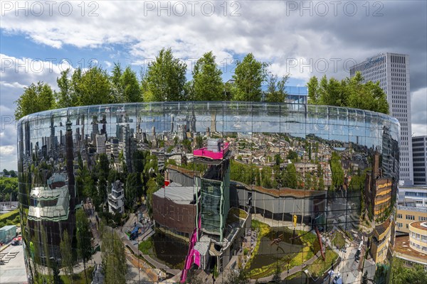 The Boijmans Van Beuningen depot in Rotterdam, show depot of the Boijmans Van Beuningen art museum, over 15, 000 exhibits that are not on display in the museum are presented here, exterior façade with 1664 curved reflective glass panes, birch forest on the roof, Netherlands