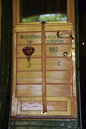 Europe, Germany, Aumühle, Holstein, Duchy of Lauenburg, Hamburg metropolitan region, Aumühle engine shed museum railway, passenger coach from 1892, BLick in 3rd class compartment, wooden class, door, Europe