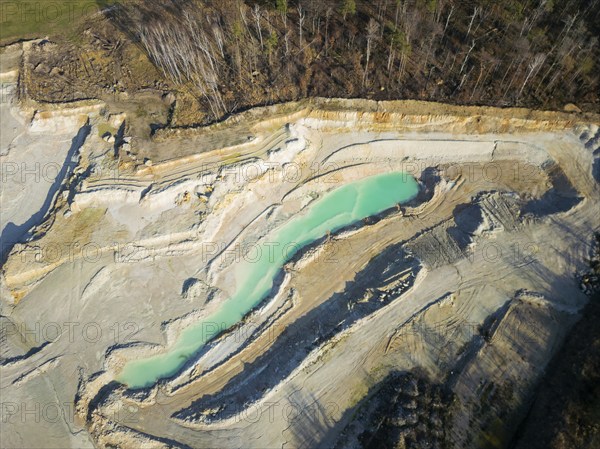 The Blue Hole, a residual hole from the kaolin mining operations of Kaolin- und Tonwerke Seilitz-Löthain GmbH, is now a natural paradise, but can only be entered by anglers, Ockrilla, Saxony, Germany, Europe