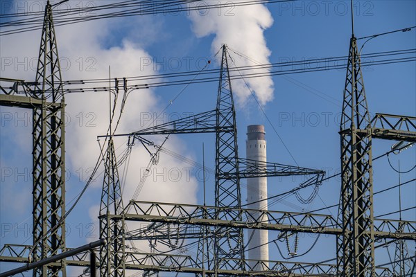 380 kV system, switchgear, from transmission system operator Amprion, in the Emscherbruch in Herten, chimney of the STEAG combined heat and power plant in Herne, North Rhine-Westphalia, Germany, Europe