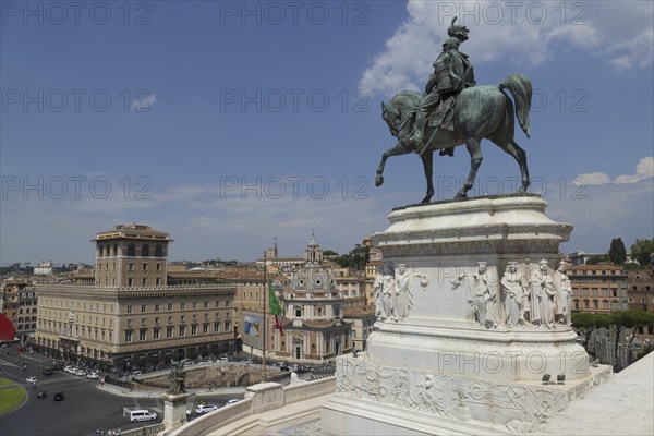 View from the Monumento Vittorio Emanuele II, Piazza Venezia, of the equestrian statue of Vittorio Emanuele and the Prefettura, Rome, Italy, Europe