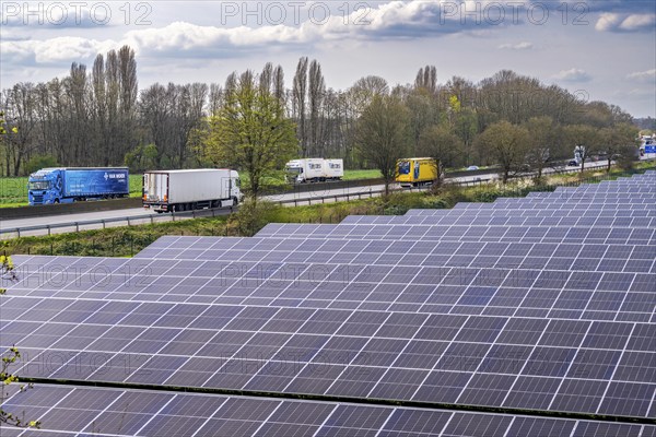 Solar park near Neukirchen-Vluyn, along the A40 motorway, over 10, 000 solar modules spread over 4.2 hectares, generating 6 million kilowatt hours per year, North Rhine-Westphalia, Germany, Europe