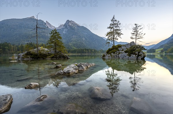 Hochkalter reflected in Hintersee, at sunset, Berchtesgaden National Park, Ramsau, Upper Bavaria, Bavaria, Germany, Europe