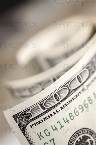 Abstract of one hundred dollar bills with narrow depth of field