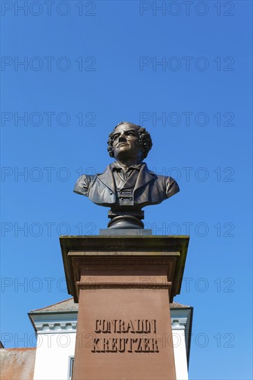 Monument in honour of Conradin Kreutzer, musician, conductor and composer, bust by Hans Baur, sculptor, sculpture, portrait, portrait, head, face, detail, pedestal, writing, letters, public art, statue, Meßkirch, district of Sigmaringen, Baden-Württemberg. Germany