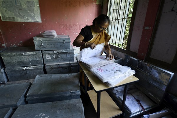 An official checks the documents submitted by people at an National Register of Citizens (NRC) Seva Kendra in Guwahati, Assam, India on Aug 30, 2019. The NRC with the final list of citizens will be published tomorrow on August 31, 2019