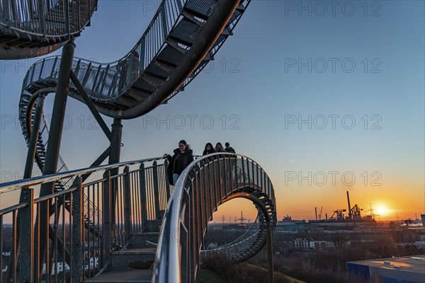 Landmark Angerpark Tiger & Turtle, Magic Mountain, walk-in sculpture in the form of a rollercoaster on the Heinrich-Hildebrand-Höhe spoil tip, HKM steelworks, sunset, Duisburg, North Rhine-Westphalia, Germany, Europe