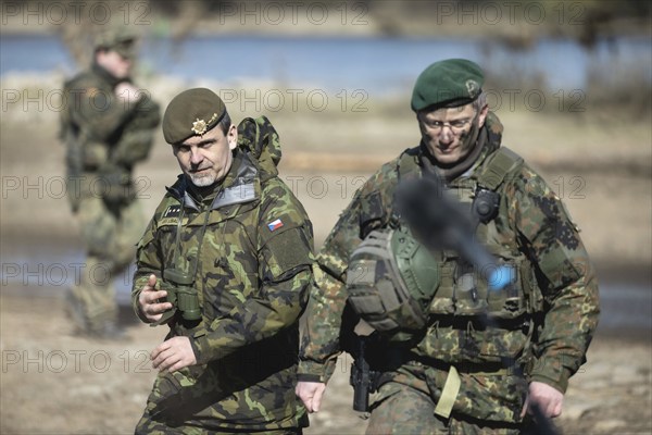 (L-R) Colonel Jiri Lila, Commander 4th Rapid Deployment Brigade, and Brigadier General Alexander Krone, Commander NATO Response Force Land Brigade, photographed during the military exercise 'Wettiner Schwert' near Tangermünde, 26.03.2024. 'Wettiner Schwert' is part of the Quadriga Exercise of the German Armed Forces and the NATO Grand Manoeuvre Steadtfast Defender 2024