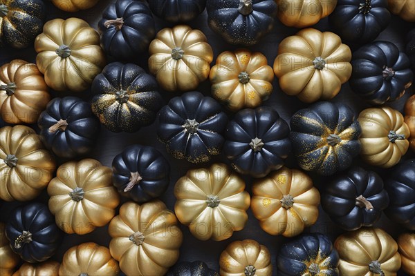 Top view of many small golden and black pumpkins. Generative Ai, AI generated