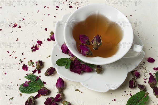 Cup of tea, damask rose, pink tea, close-up