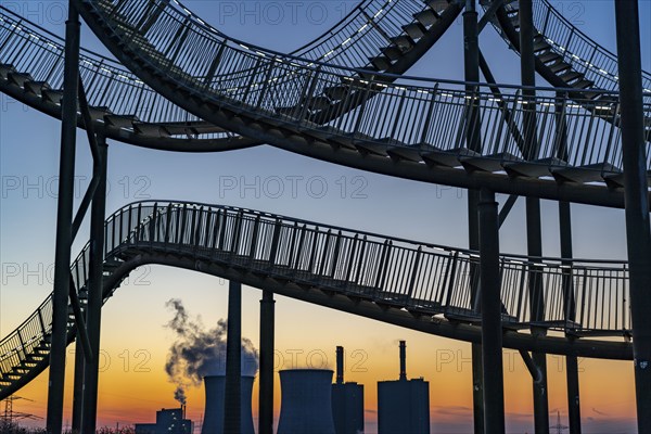 Landmark Angerpark Tiger & Turtle, Magic Mountain, walk-in sculpture in the form of a rollercoaster on the Heinrich-Hildebrand-Höhe spoil tip, HKM steelworks, sunset, Duisburg, North Rhine-Westphalia, Germany, Europe