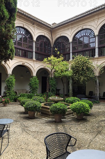 Inner courtyard with fountain and flower pots, Hotel Parador de Granada, former Nasrid palace, monastery, Alhambra, Granada, Andalusia, Spain, Europe