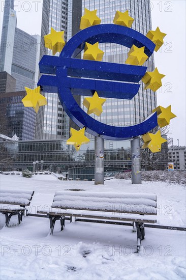 Winter in Frankfurt, euro sculpture at Willy-Brandt-Platz, snow-covered, Hesse, Germany, Europe