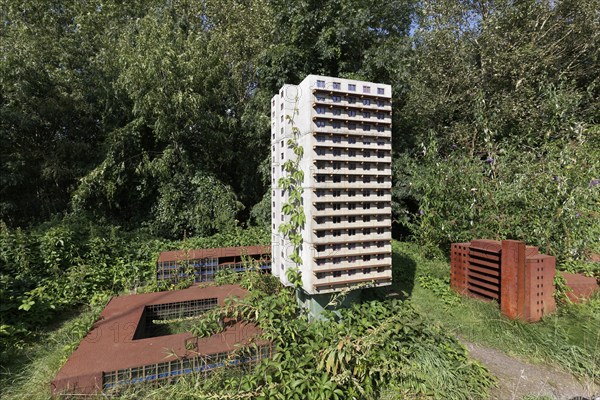 Already demolished residential tower in miniature format, art installation Neustadt by Marta Dyachenko and Julius von Bismarck on the Emscherkunstweg, Landschaftspark Duisburg-Nord, Duisburg, North Rhine-Westphalia, Germany, Europe