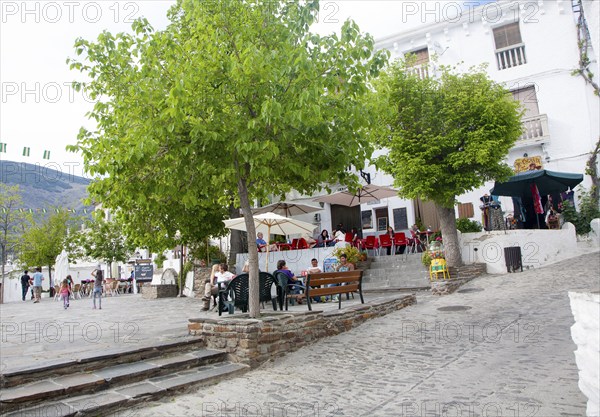 Cafes in square plaza village of Capileira, High Alpujarras, Sierra Nevada, Granada province, Spain, Europe