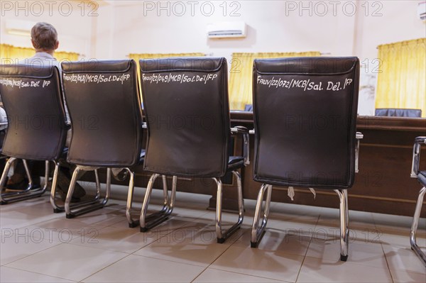 Inventory marking on chairs in the meeting room of the Governor of Bohicon, 06/03/2024