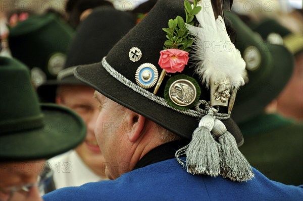 Man of a Bavarian shooting club from Chiemgau in traditional traditional costume, decorated hat with medals, old marquee, historic Wies'n, Oide Wiesn, Oktoberfest, Munich, Upper Bavaria, Bavaria, Germany, Europe