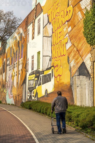 Large mural as part of the Urbanart campaign Weltbaustellen North Rhine-Westphalia, on the themes of ecology, environment, social issues, economy, society, by artists from Germany and Kenya, on Friedrich-Eber-Strasse, in Mülheim an der Ruhr, North Rhine-Westphalia, Germany, Europe