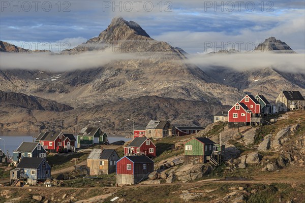 Inuit settlement at a fjord with icebergs, mountainous, autumn, sunny, Tasiilaq, East Greenland, Greenland, North America