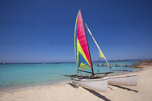 Catamaran sailboat in Illetes beach of Formentera at Balearic Islands