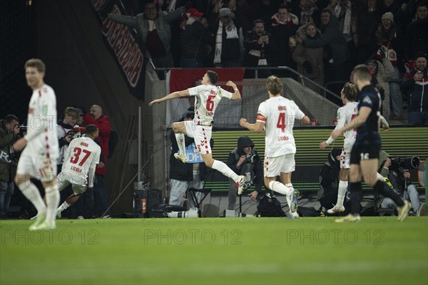 BEAUTIFUL SPORTS/ (DFL/DFB REGULATIONS PROHIBIT ANY USE OF PHOTOGRAPHS AS IMAGE SEQUENCES AND/OR QUASI-VIDEO) Cologne, RheinEnergieStadion, North Rhine-Westphalia, cheering for the winning goal, Eric Martel (1.FC Köln, midfield, #6), Dejan Ljubicic (1.FC Köln, midfield, #7), Tim Lemperle (1.FC Köln, forward, #19), Damion Downs (1.FC Köln, forward, #42), DFB-Pokal 1.FC Köln, Hertha BSC on 04.12.2024 at RheinEnergieStadion in Cologne Germany