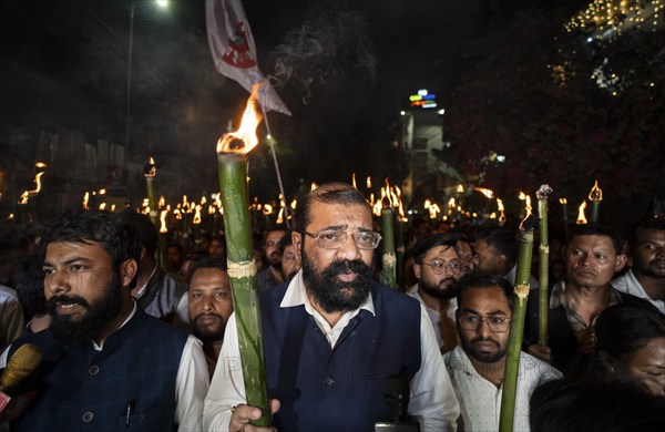 Members of the All Assam Students' Union (AASU) take part in a flaming torch rally and shout slogans to protest against the implementation of the Citizenship Amendment Act (CAA), on March 12, 2024 in Guwahati, Assam, India. The Citizenship Amendment Act (CAA), passed by the Indian Parliament in 2019, indeed grants expedited citizenship to specific religious minorities from Afghanistan, Bangladesh, and Pakistan who arrived in India on or before December 31, 2014. These religious minorities include Hindus, Sikhs, Buddhists, Jains, Parsis, and Christians, Asia