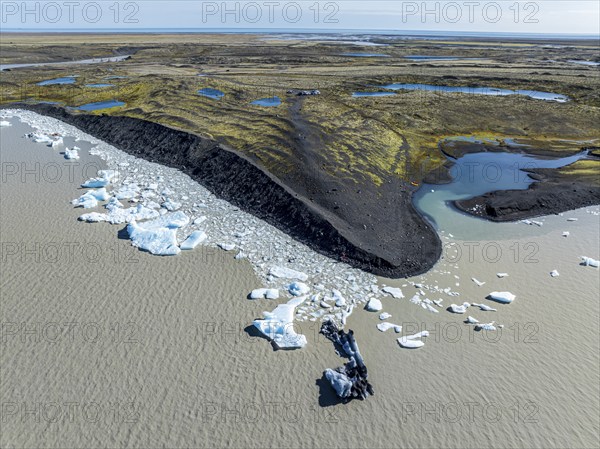 Aerial view over the glacial lake Fjallsárlón, glacier Fjallsjökull, part of Vatnajökull glacier, Iceland, Europe