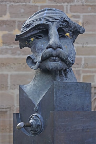 Sculpture Lech and Malsche by Jürgen Goertz, Lech, male figure, head, face, bizarre, abstract, modern, whimsical, bronze, nose, mouth, thick, bulging, upper lip, ear, Johann-Sebastian-Bach-Platz, Ansbach, Middle Franconia, Franconia, Bavaria, Germany, Europe