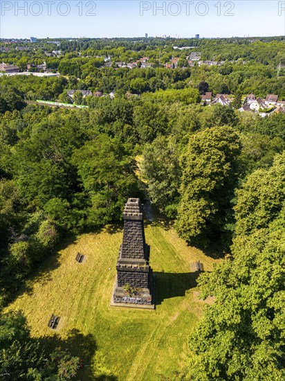 The Mechtenberg in Essen, one of the few natural elevations from the ice age in the Ruhr area, was once 100 metres above sea level, but due to mining subsidence it is now only around 80 metres above sea level, Bismarck Column, view to the west towards Essen, part of the Mechtenberg Landscape Park, North Rhine-Westphalia, Germany, Europe