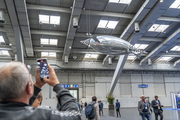 Mechanical flying objects, filled with helium, controlled by fine mechanics, movements copied from animals, birds, fish, bionics applied, to illustrate technical processes, by automation specialists Festo, at the Hannover Messe, Lower Saxony, Germany, Europe