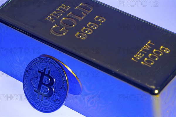 Cryptocurrency, gold bar, guarantor for analogue currencies, symbol coin, optical placeholder for the digital currency, blockchain, stock market prices