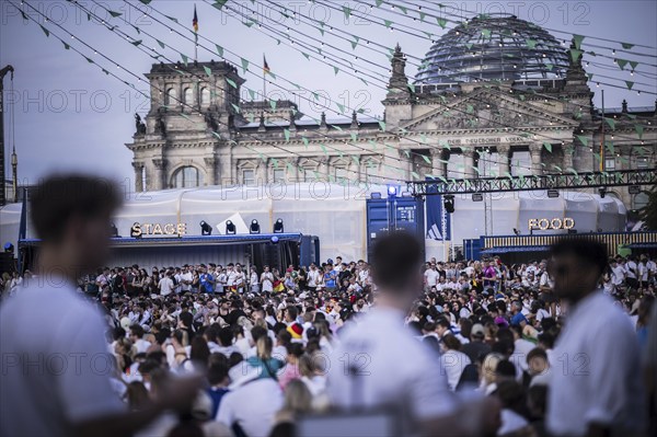 Scenes in the fan zone on Platz der Republik in front of the Reichstag building taken in Berlin, 29 June 2024 during the broadcast of the football match between Denmark and Germany