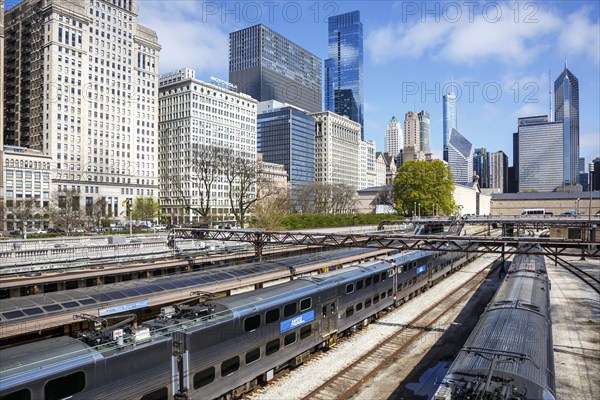 Skyline with METRA commuter train railway at Van Buren Street station in Chicago, USA, North America