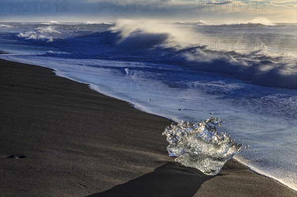 Ice floes on the beach, waves, sunny, morning mood, winter, Diamond Beach, Breidamerkursandur, Jökulsarlon, Iceland, Europe