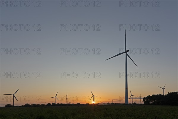 Sunset, wind turbines, silhouettes, Melbeck, Samtgemeinde Ilmenau, Lower Saxony, Germany, Europe