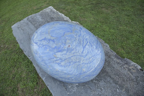 Sculpture stone drop by Livia Kubach and Michael Kropp 2024, oval blue quartz, stone, smooth, cut, polished, surface, marbled, oval, blue, large gemstone, stone sculpture park, Ebernburg, Bad Münster am Stein-Ebernburg, Bad Kreuznach, Rhineland-Palatinate, Germany, Europe