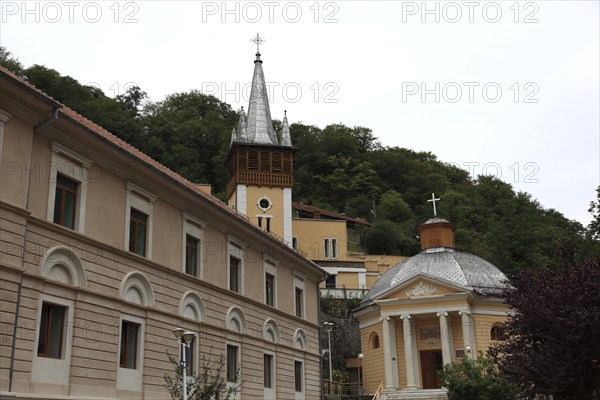 Banat, spa, Hercules bath, Baile Herculane, houses and church in the old town centre, Romania, Europe