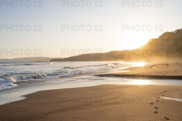 Sandy beach beach and sea at sunset, Playa Cocalito, coastal landscape, Pacific coast, Nicoya Peninsula, Puntarenas Province, Costa Rica, Central America