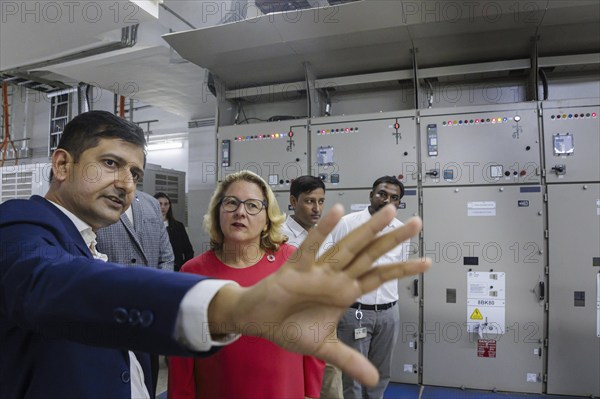 Svenja Schulze (SPD), Federal Minister for Economic Cooperation and Development, visits the technology room in a metro station with explanations from Siemens India in Ahmedabad, 15/09/2024