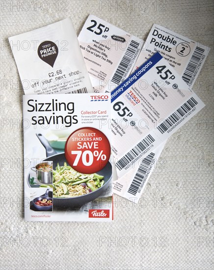 Tesco supermarket savings vouchers close up from above, UK