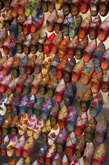 Small babouche magnets on a market, shoes, painted, trade, market, trader, bazaar, offer, colourful, handicraft, Islam, souk, medina, product presentation, display, trade, tourism, Sovenian, travel, African, Arabic, Essaouira, Morocco, Africa