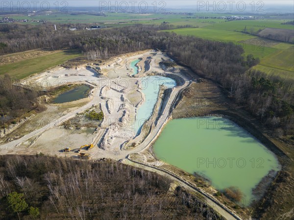 The Blue Hole, a residual hole from the kaolin mining operations of Kaolin- und Tonwerke Seilitz-Löthain GmbH, is now a natural paradise, but can only be entered by anglers, Ockrilla, Saxony, Germany, Europe