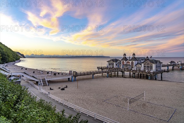 The pier of Sellin, evening mood, sunset, 394 metres long, with restaurant, jetty, beach chairs, island of Rügen, Mecklenburg-Western Pomerania, Germany, Europe