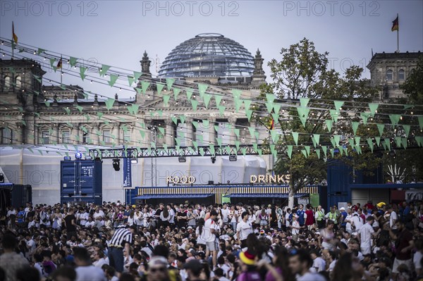 Scenes in the fan zone on Platz der Republik in front of the Reichstag building taken in Berlin, 29 June 2024 during the broadcast of the football match between Denmark and Germany