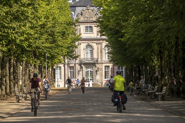 The Jägerhofallee in the Hofgarten, the central municipal park in Düsseldorf, view of Jägerhof Palace, North Rhine-Westphalia, Germany, Europe