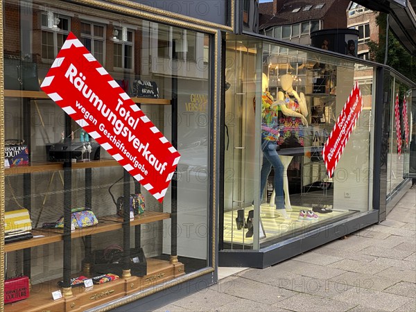 Clearance sale, business closure, fashion shop in the old town centre of Bremen, Germany, Europe