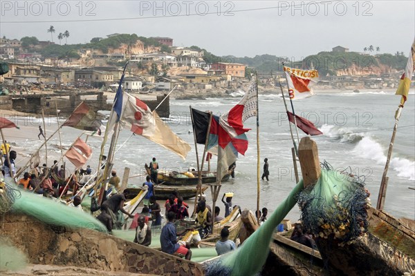 Traditional wooden fishing boats in the fishing harbour of Cape Coast, Cabo Corso, Ghana, West Africa, Africa