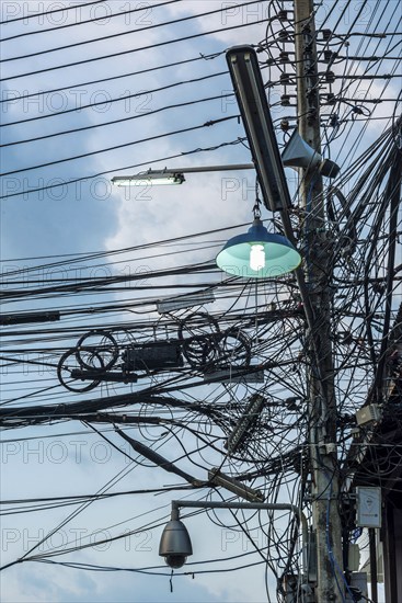 Cable, wiring, electricity, power supply, order, chaos, chaotic, electricity, electric, confusion, confusion, danger, dangerous, infrastructure, connection, chaotic, structure, technology, progress, supply, high voltage, ailing, light, lamp, power cable, Thailand, Asia