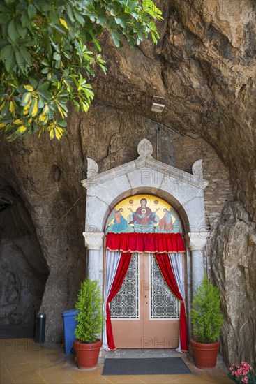 Sanctuary entrance in rock face, red curtains, religious icons, Church of Mary the Fountain of Life, Zoodochos Pigi, rock church, Kefalari, Argolis, Peloponnese, Greece, Europe